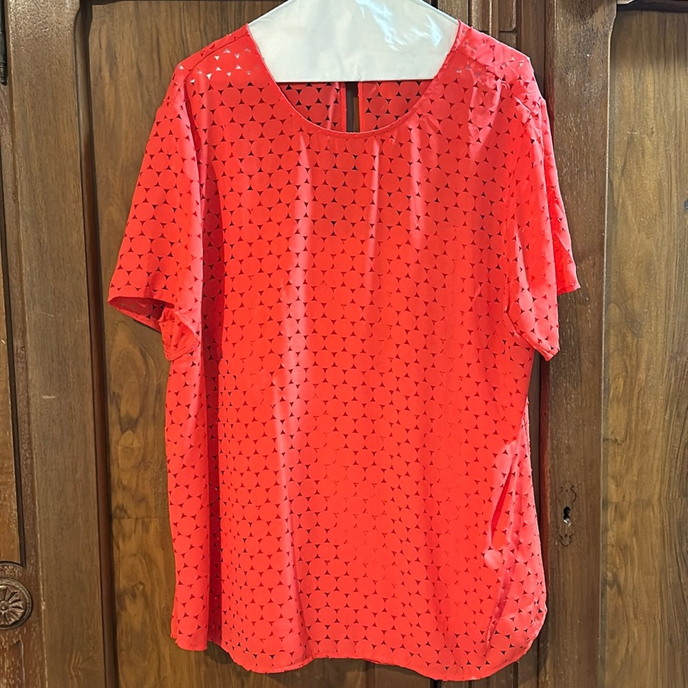 Orange/red colored blouse